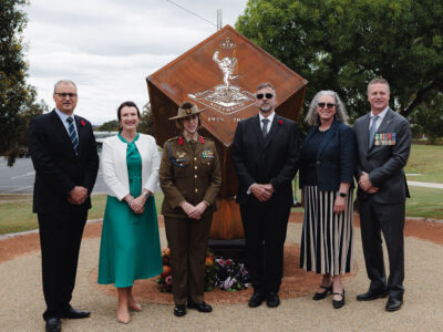 PentenAmio employees and members of RA Sigs standing around the Certa Cito Foundation's Centenary Sculpture